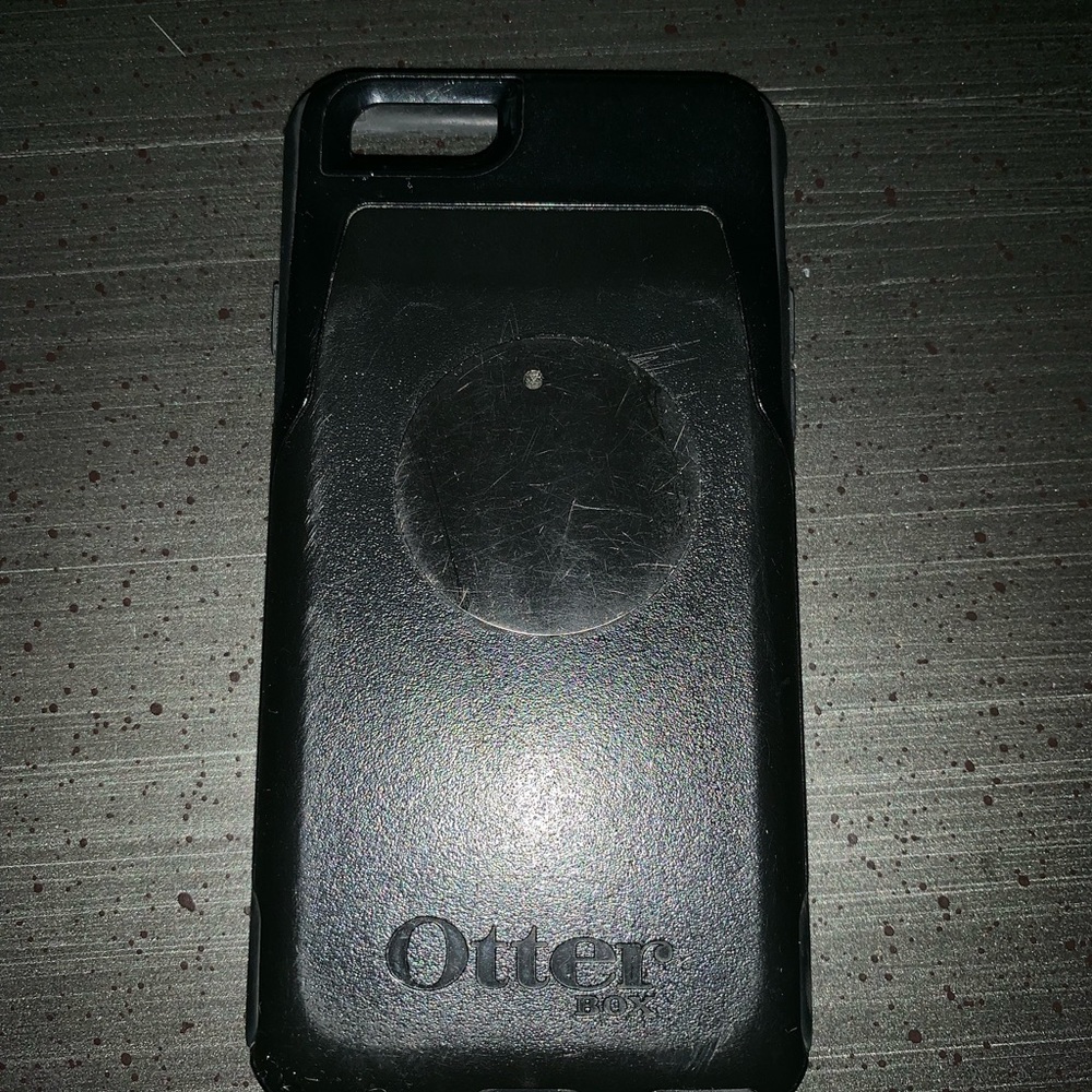 Black otter box phone case with credit card holder